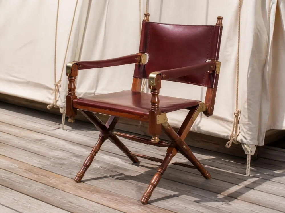 Aravali leather campaign chair in solid teak with brass fittings