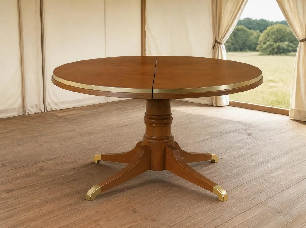 Bharatpur round dining table in solid teak with brass fittings