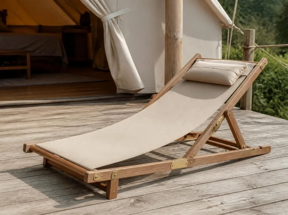 Kaziranga deck lounger in solid teak with brass fittings