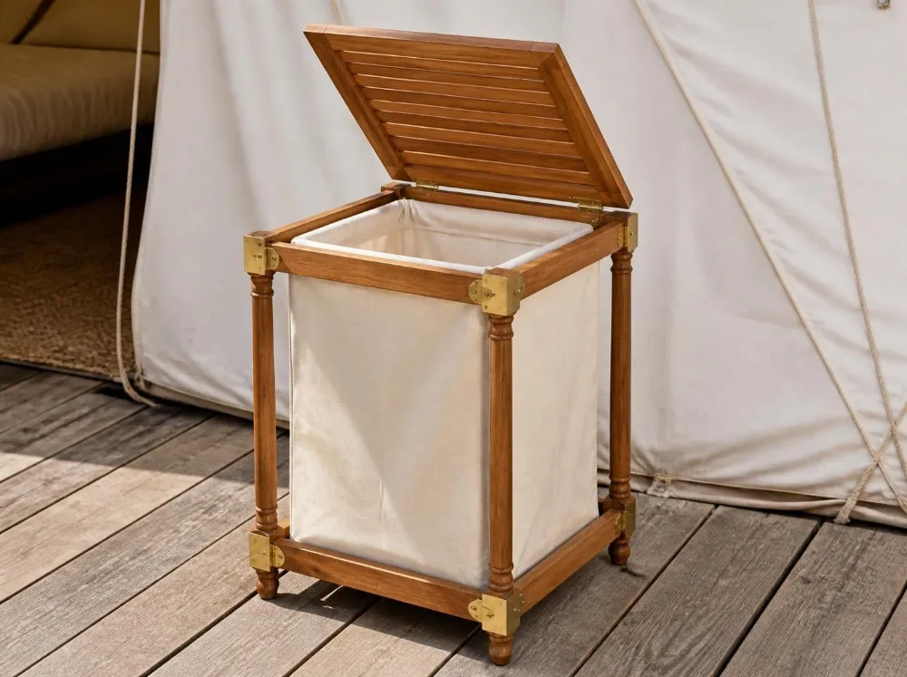 Majuli laundry hamper in solid teak with brass fittings
