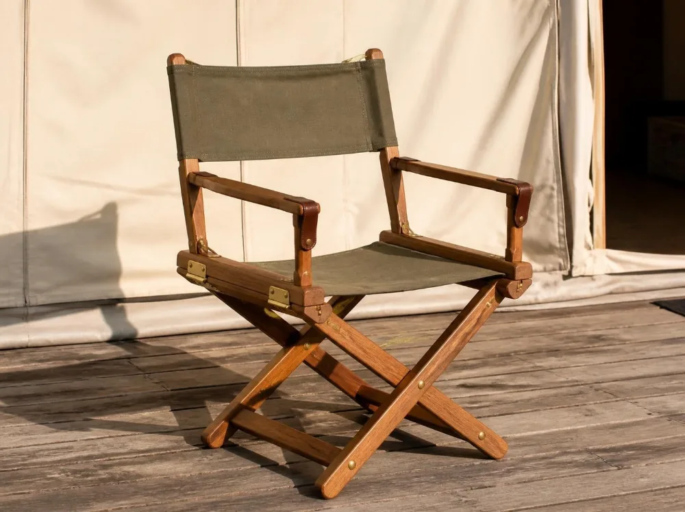 Munnar safari chair in solid teak with brass fittings