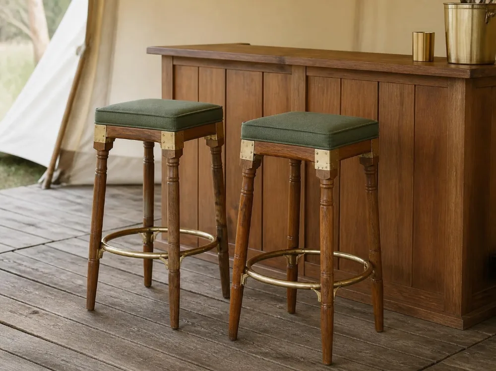 Pali bar stool in solid teak with brass fittings