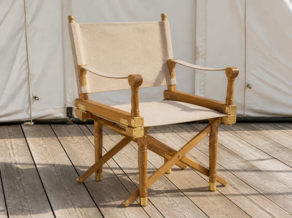 Sariska canvas campaign chair in solid teak with brass fittings