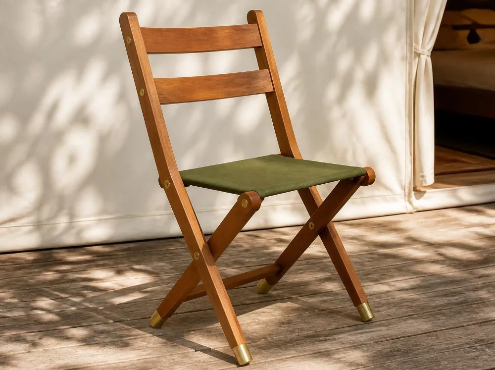Sundarban folding dining chair in solid teak with brass fittings