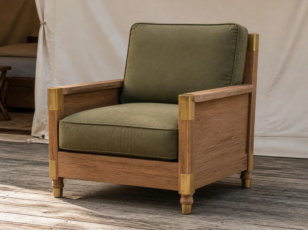 Udaipur canvas armchair in solid teak with brass fittings